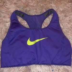 Purple nike sports bra w/ yellow swoosh